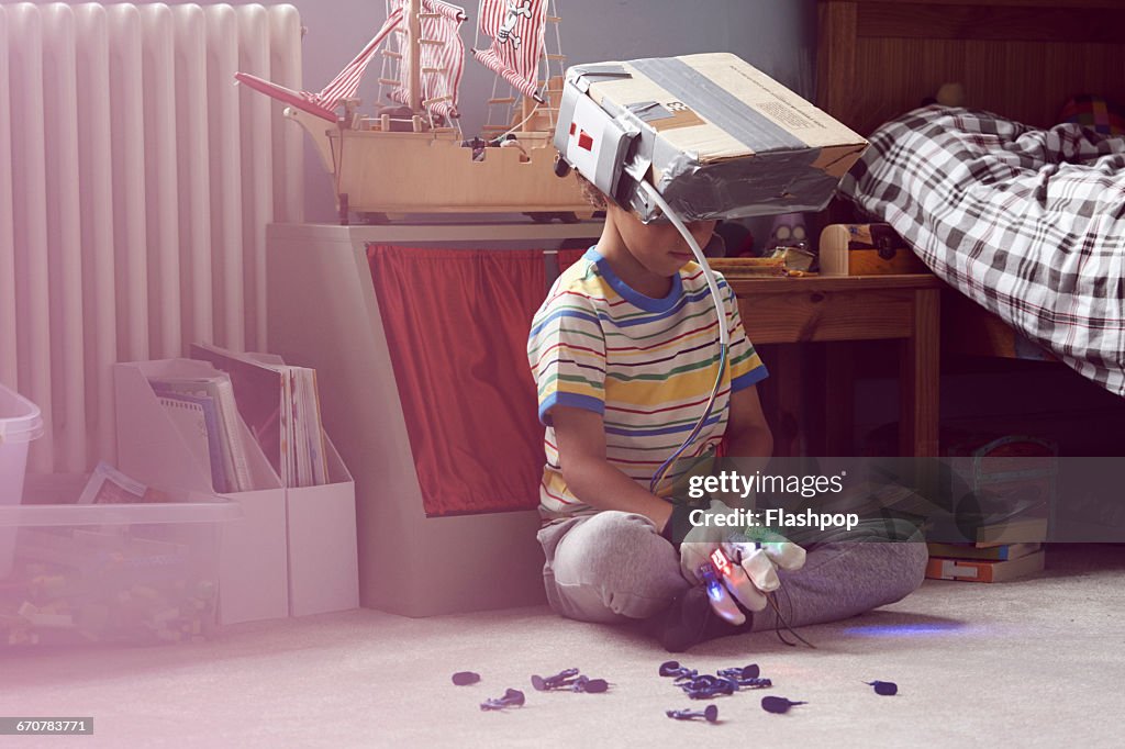 Boy wearing home made virtual reality headset