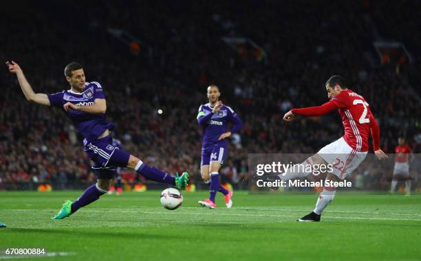 Henrikh Mkhitaryan of Manchester United scores their first goal during the UEFA Europa League quarter final second leg match between Manchester...