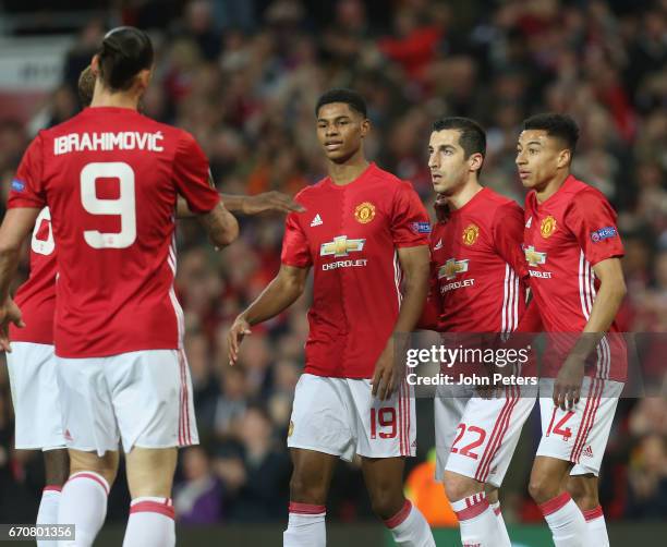 Henrikh Mkhitaryan of Manchester United celebrates scoring their first goal during the UEFA Europa League quarter final second leg match between...