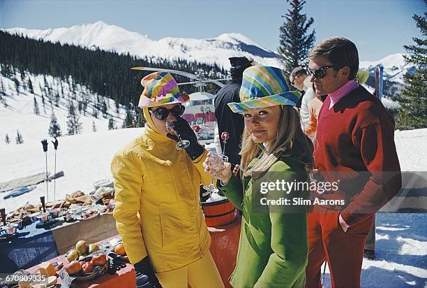 Women in colourful hats at an apres ski party in Snowmass Village, in Pitkin County, Colorado, in March 1968.