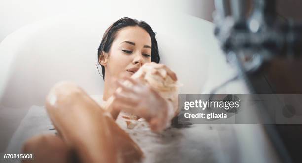 relaxing bath. - woman shower bath imagens e fotografias de stock