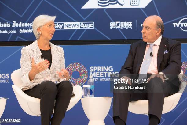 In this handout provided by the IMF, International Monetary Fund Managing Director Christine Lagarde is joined on panel by Muhtar Kent , CEO, Coca...
