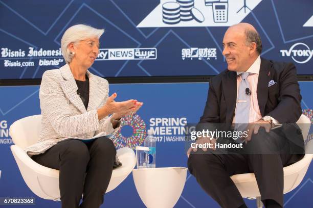 In this handout provided by the IMF, International Monetary Fund Managing Director Christine Lagarde is joined on panel by Muhtar Kent , CEO, Coca...