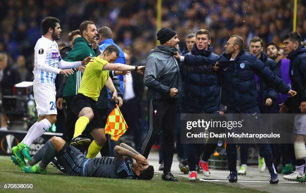 Players and staff of Celta Vigo and Genk clash during the UEFA Europa League quarter final second leg between KRC Genk and Celta Vigo at Luminus...