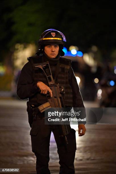 Police officers secure the area after a gunman opened fire on Champs Elysees on April 20, 2017 in Paris, France. One police officer has been killed,...