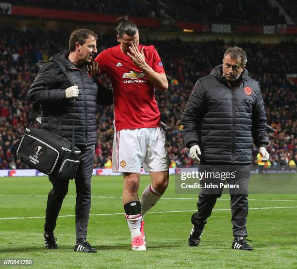 Zlatan Ibrahimovic of Manchester United leaves the match with an injury during the UEFA Europa League quarter final second leg match between...