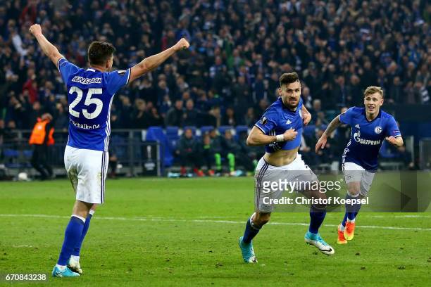 Daniel Caligiuri of Schalke (C celebrates the third goal with Klaas-Jan Huntelaar and Max Meyer of Schalke during the UEFA Europa League quarter...