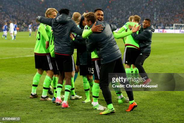 The team of Amsterdam celebrates the first goal by Nick Viergever of Amsterdam during the UEFA Europa League quarter final second leg match between...