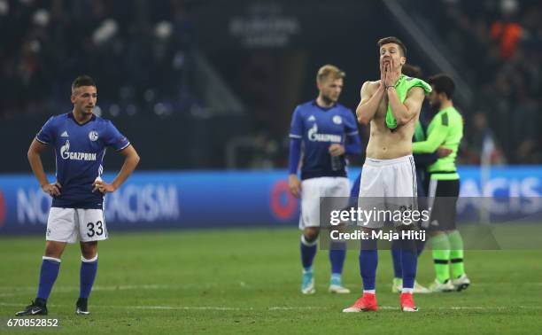 Matija Nastasic of FC Schalke 04 and team mates look dejected after the UEFA Europa League quarter final second leg match between FC Schalke 04 and...