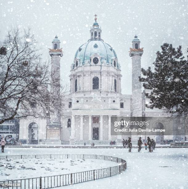 karlskirche/st charles church in vienna in snow. - karlskirche stock-fotos und bilder