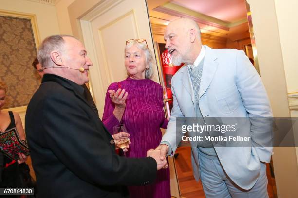 Host Rudolf John welcomes John Malkovich at the Romy Akademie Preis 2017 at Grand Hotel Vienna on April 20, 2017 in Vienna, Austria.