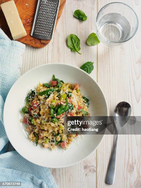 healthy pearl barley risotto - risotto stock pictures, royalty-free photos & images