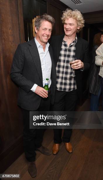 Hugh Grant and Simon Farnaby attend a gala screening of "Mindhorn" at the May Fair Hotel on April 20, 2017 in London, England.