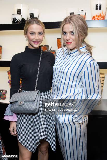 Sophie Hermann and Olivia Cox attend the UK flagship store opening of luxury Parisian candle and home fragrance brand, Baobab on Walton Street, on...