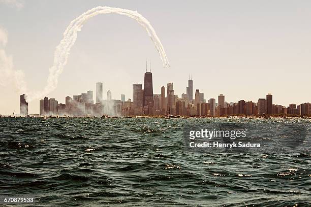 illinois, chicago, lake michigan and city skyline with skyscrapers - airshow stock pictures, royalty-free photos & images