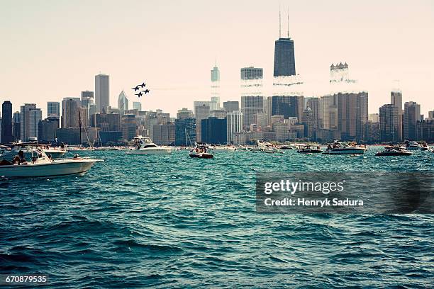 illinois, chicago, air and water show seen from lake michigan - espectáculo aéreo fotografías e imágenes de stock