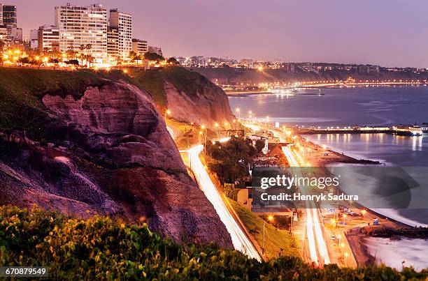 peru, lima, miraflores, cliffs of miraflores at sunset - lima peru stock pictures, royalty-free photos & images