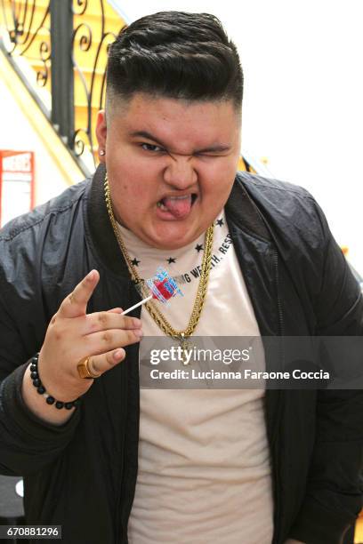 Actor Jovan Armand enjoys a Zollipop at a day of IMPRESSIONS with brands and influencers at The Artists Project on April 20, 2017 in Los Angeles,...