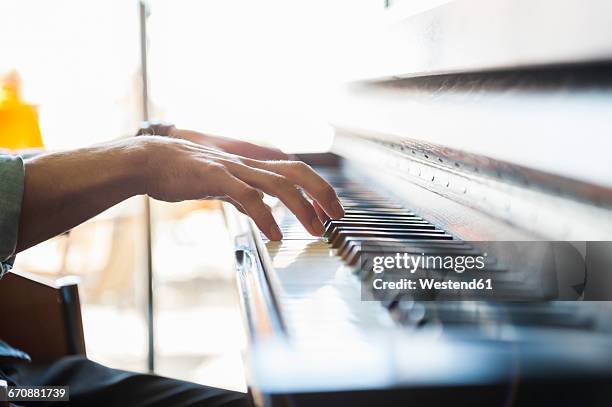 close-up of man playing piano - pianist imagens e fotografias de stock