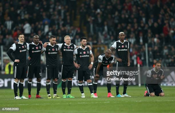 Players of Besiktas dejected after losing the penalty shootout against Olympique Lyonnais during the UEFA Europa League quarter final second match...