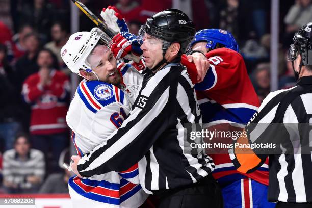 Linesman Pierre Racicot tries to breakup a scuffle between Rick Nash of the New York Rangers and Shea Weber of the Montreal Canadiens in Game Five of...