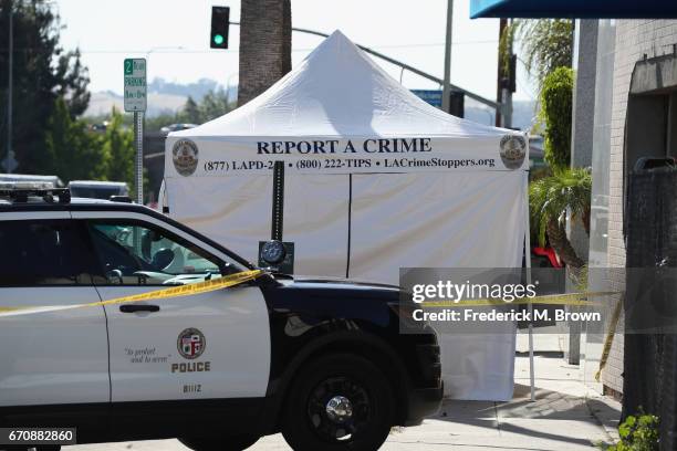 Police are seen near the site where singer Cuba Gooding Sr. Was found dead in his car on April 20, 2017 in Woodland Hills, California. Gooding was 72...