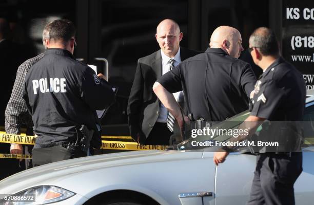 Police are seen near the site where singer Cuba Gooding Sr. Was found dead in his car on April 20, 2017 in Woodland Hills, California. Gooding was 72...