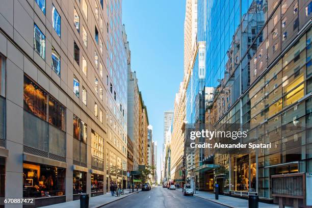 empty street in midtown manhattan, new york city, usa - avenue stock pictures, royalty-free photos & images