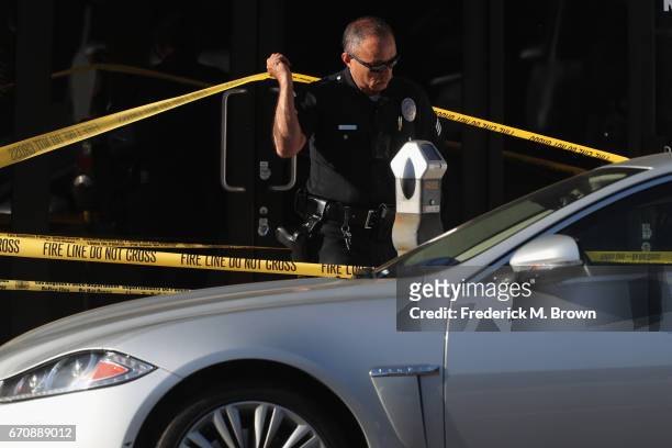 Police are seen near the site where singer Cuba Gooding Sr. Was found dead in his car on April 20, 2017 in Woodland Hills, California. Gooding was 72...