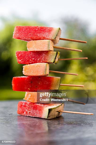 stack of watermelon and rockmelon popsicles - rockmelon stock pictures, royalty-free photos & images