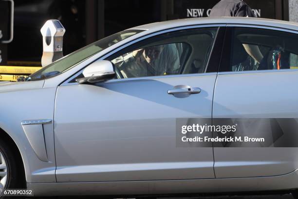 Police search the car where singer Cuba Gooding Sr. Was found dead on April 20, 2017 in Woodland Hills, California. Gooding was 72 years old.