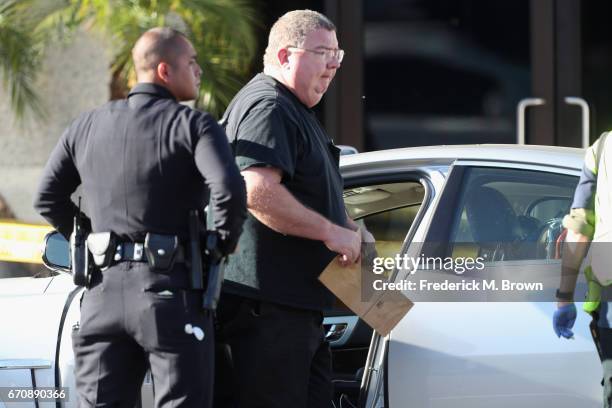 Police search the car where singer Cuba Gooding Sr. Was found dead on April 20, 2017 in Woodland Hills, California. Gooding was 72 years old.