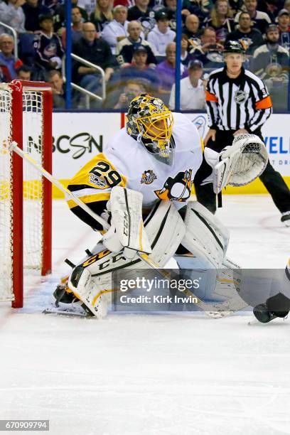 Marc-Andre Fleury of the Pittsburgh Penguins follows the puck in Game Four of the Eastern Conference First Round during the 2017 NHL Stanley Cup...