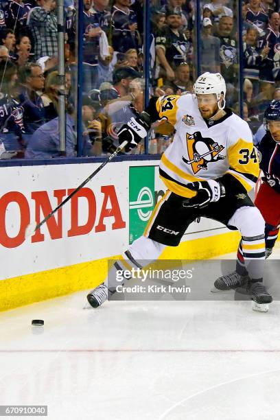 Tom Kuhnhackl of the Pittsburgh Penguins controls the puck in Game Four of the Eastern Conference First Round during the 2017 NHL Stanley Cup...