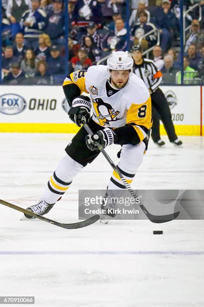 Brian Dumoulin of the Pittsburgh Penguins controls the puck in Game Four of the Eastern Conference First Round during the 2017 NHL Stanley Cup...