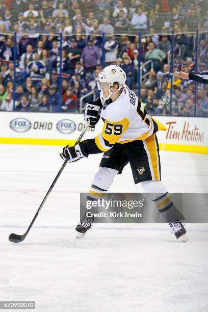 Jake Guentzel of the Pittsburgh Penguins controls the puck in Game Four of the Eastern Conference First Round during the 2017 NHL Stanley Cup...