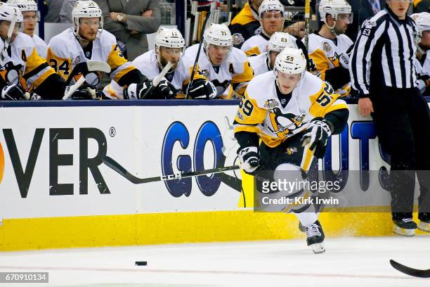 Jake Guentzel of the Pittsburgh Penguins controls the puck in Game Four of the Eastern Conference First Round during the 2017 NHL Stanley Cup...