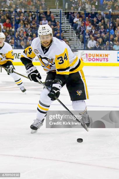 Tom Kuhnhackl of the Pittsburgh Penguins controls the puck in Game Four of the Eastern Conference First Round during the 2017 NHL Stanley Cup...