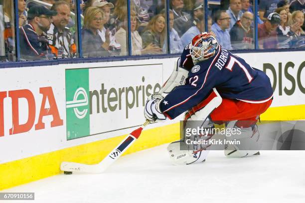 Sergei Bobrovsky of the Columbus Blue Jackets controls the puck in Game Four of the Eastern Conference First Round during the 2017 NHL Stanley Cup...