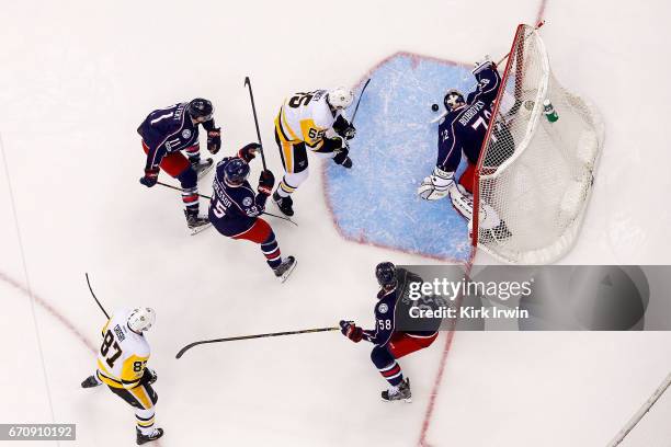 Sergei Bobrovsky of the Columbus Blue Jackets stops a shot from Ron Hainsey of the Pittsburgh Penguins in Game Four of the Eastern Conference First...