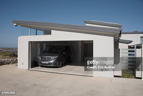 exterior of modern car garage - empty driveway stock pictures, royalty-free photos & images