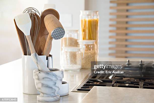 close-up of kitchen utensils on worktop - kitchen equipment stock pictures, royalty-free photos & images