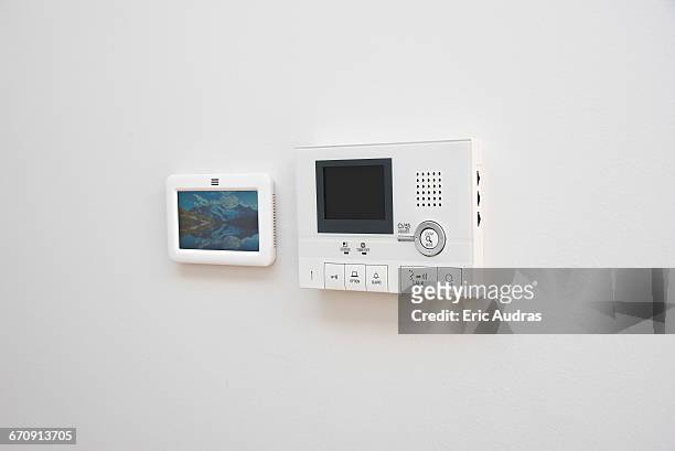 security system on wall at building entrance - security equipment stock pictures, royalty-free photos & images