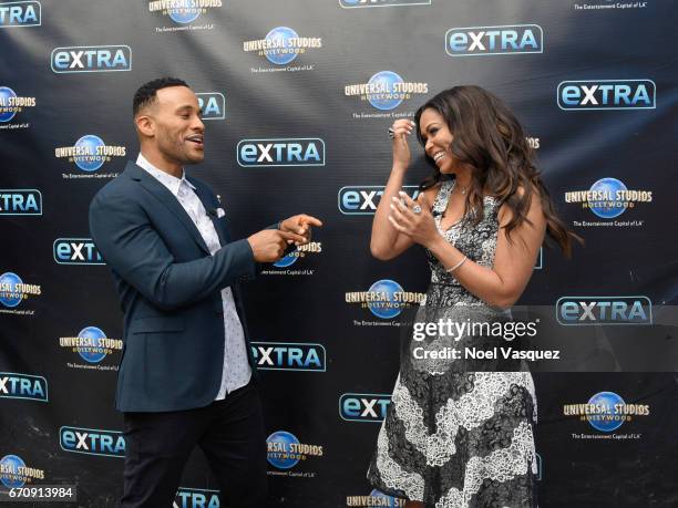 Devon Franklin and Tracey Edmonds visit "Extra" at Universal Studios Hollywood on April 20, 2017 in Universal City, California.