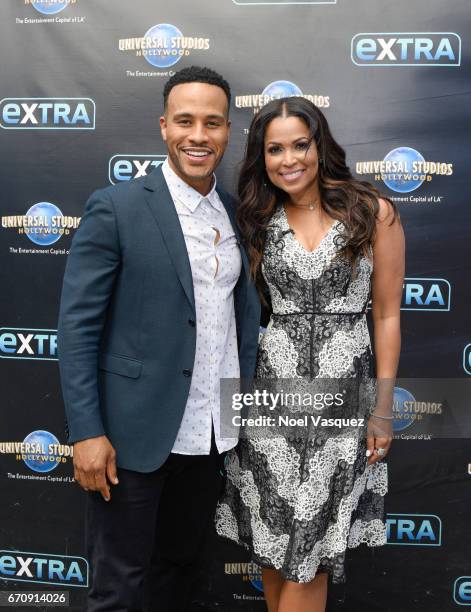 Devon Franklin and Tracey Edmonds visit "Extra" at Universal Studios Hollywood on April 20, 2017 in Universal City, California.