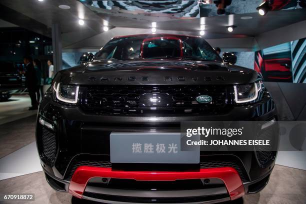 This picture taken on April 19, 2017 shows a Land Rover Range Rover Evoque car pictured during the media day of the 17th Shanghai International...