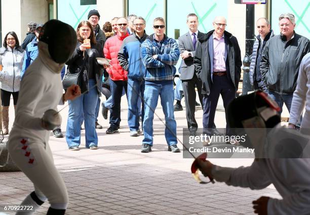 Canadian fencers and volunteers host an outdoor fencing demonstration on Sparks Street during the Medley on the Street event on April 20, 2017 in...