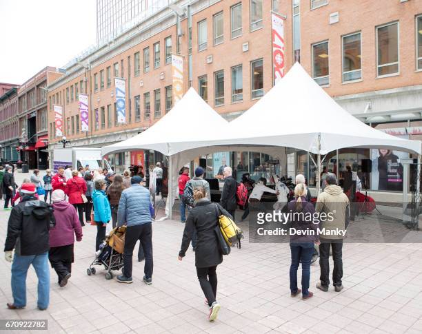 Fencers and volunteers host an outdoor fencing demonstration on Sparks Street during the Medley on the Street event on April 20, 2017 in Ottawa,...
