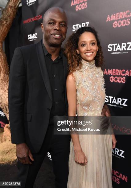 Actor Chris Obi and guest attend the "American Gods" premiere at ArcLight Hollywood on April 20, 2017 in Los Angeles, California.