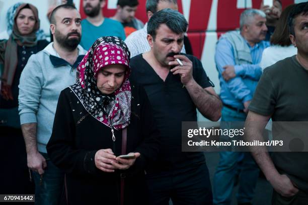 Militants of the conservative AKP party celebrate the victory of yes 'evet', in front of the seat of their party on April 16, 2017 in Istanbul,...